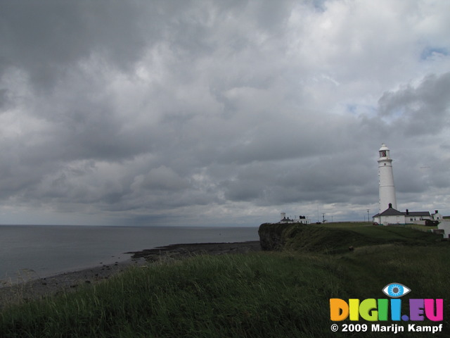SX06651 Dark clouds over Nash Point lighthouse